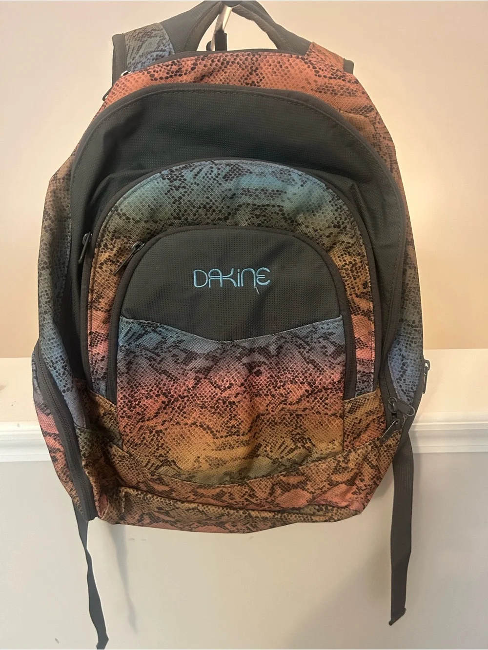 Dakine Rainbow Snake-Print Backpack in Blue, Green, Orange and Pink